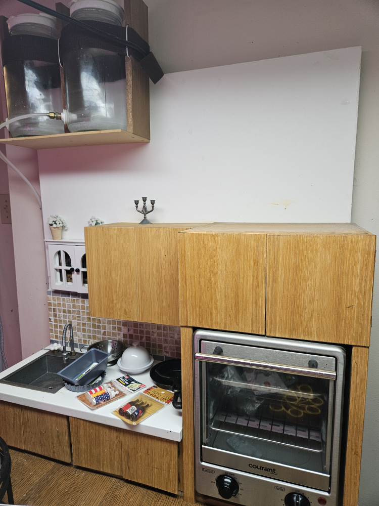 miniature kitchen with real oven, cookware amd working sink