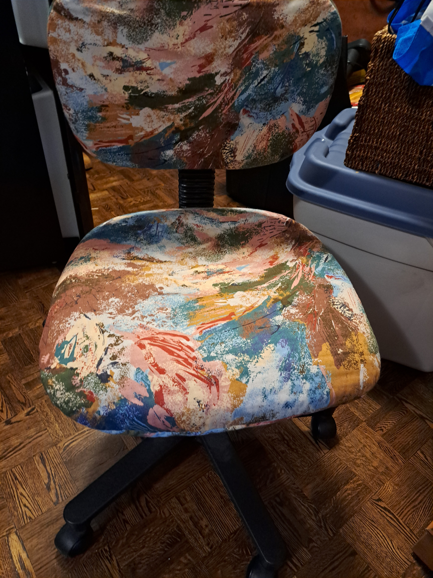 Adjustable height rolling chair. Removable covers.Warden/Finch