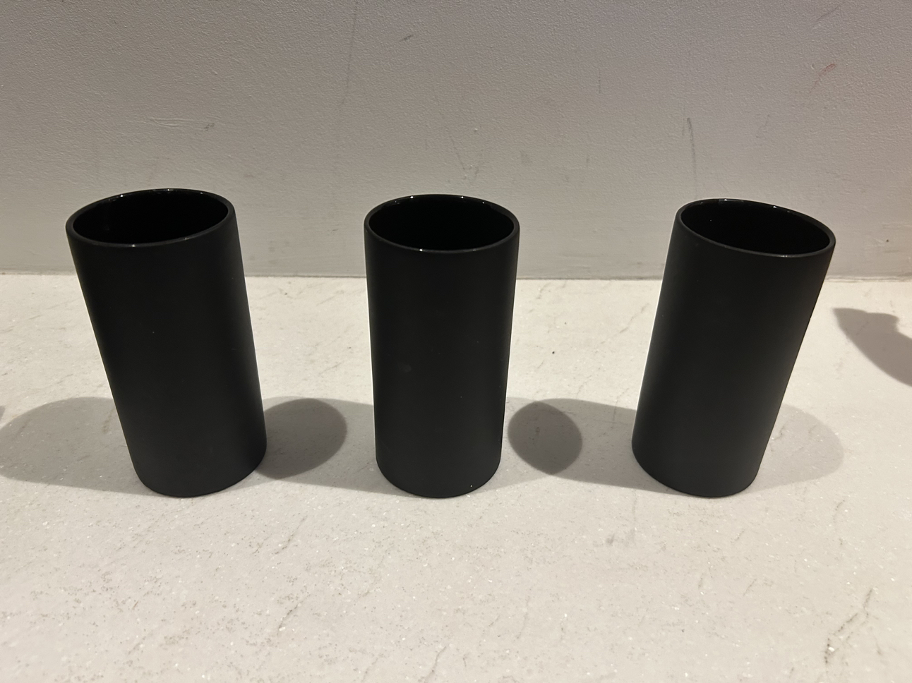 Cb2 black grouping. 3 side plates. 3 glasses. image indicator(4)