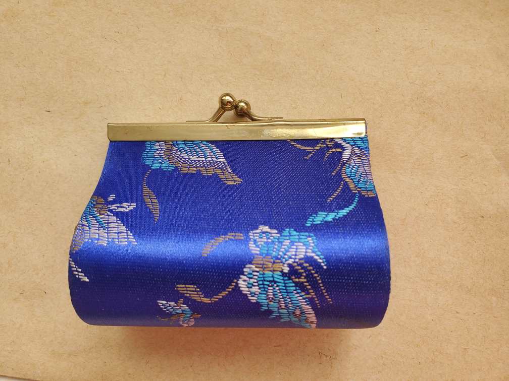 beige colour and blue colour coin purse image indicator(3)