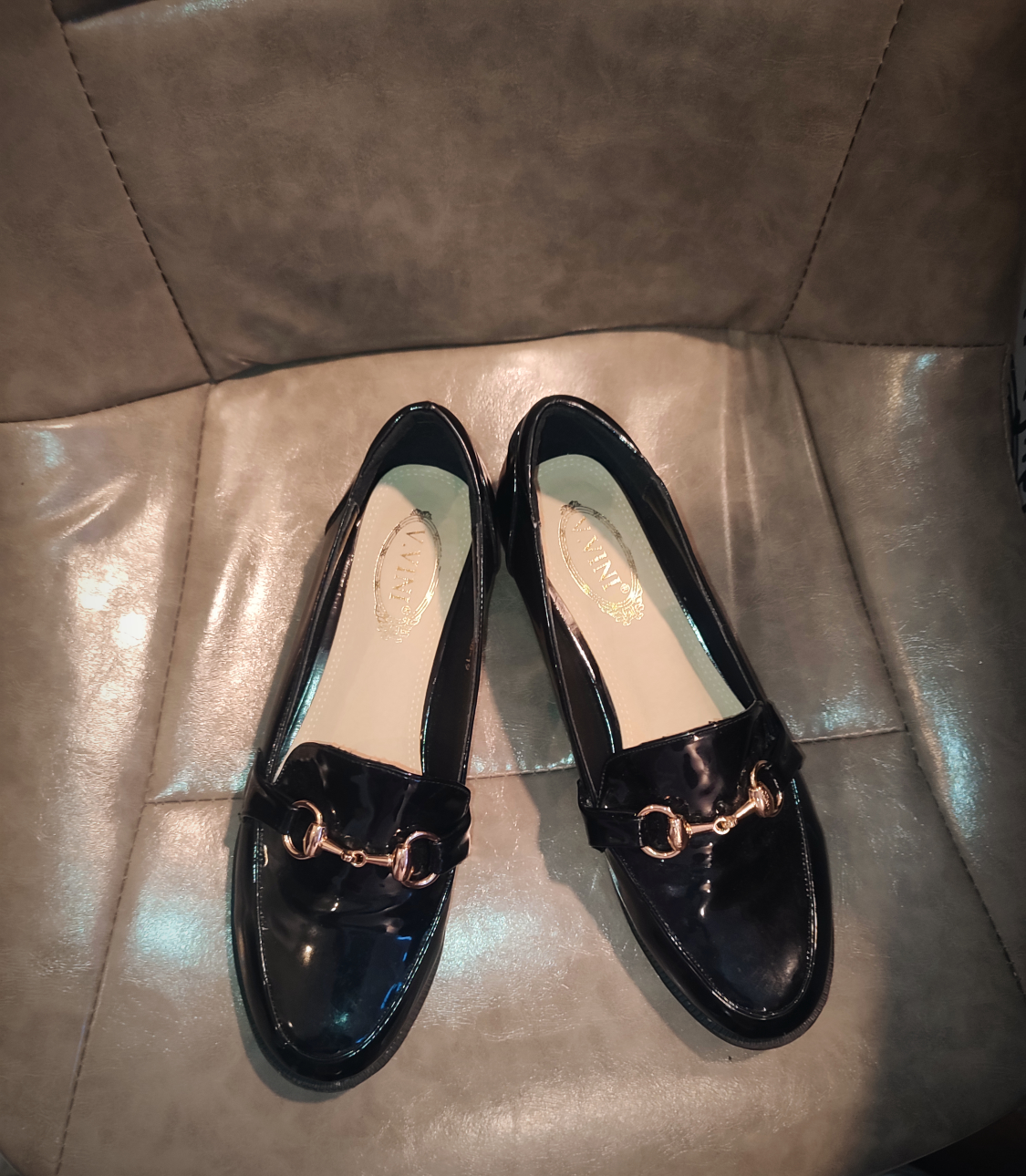 Black Horsebit slip on gloss loafers