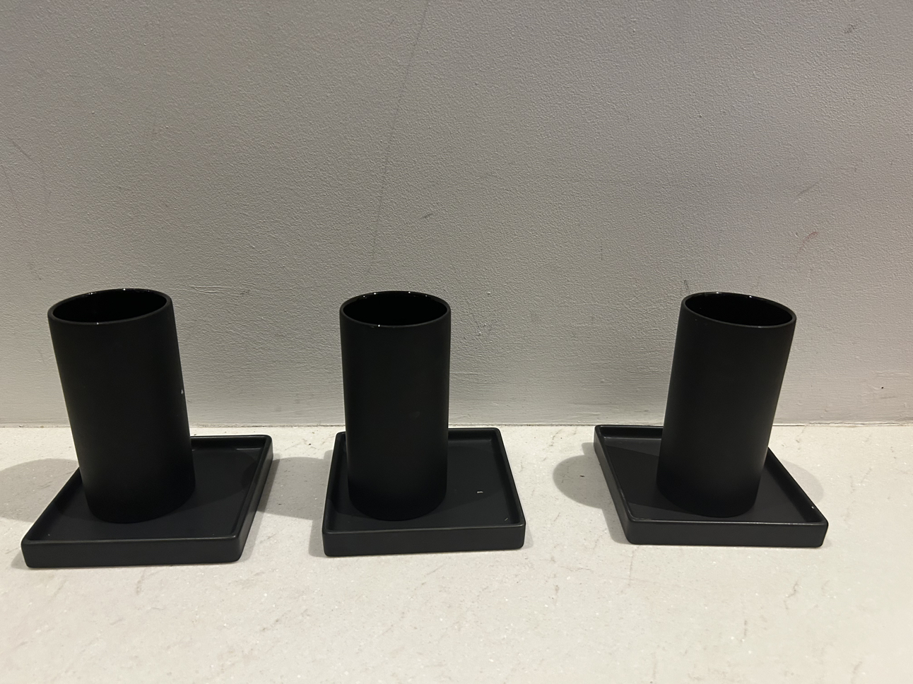 Cb2 black grouping. 3 side plates. 3 glasses. image indicator(3)