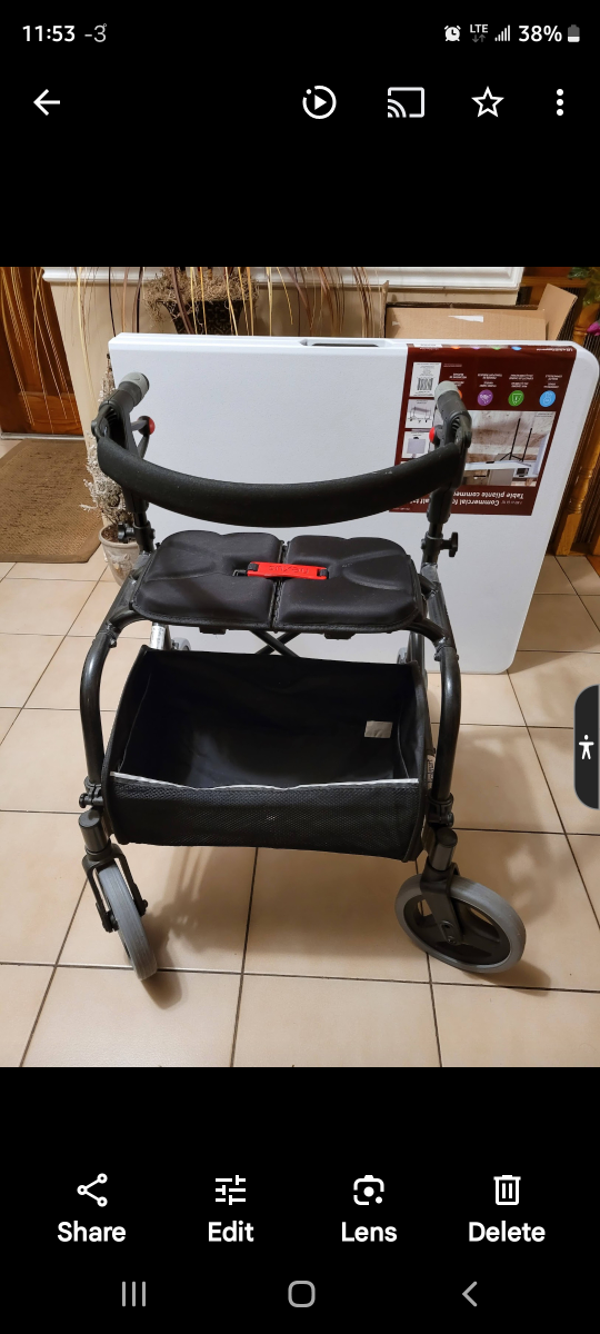 Walker/rollator with seat and storage basket - photo 3