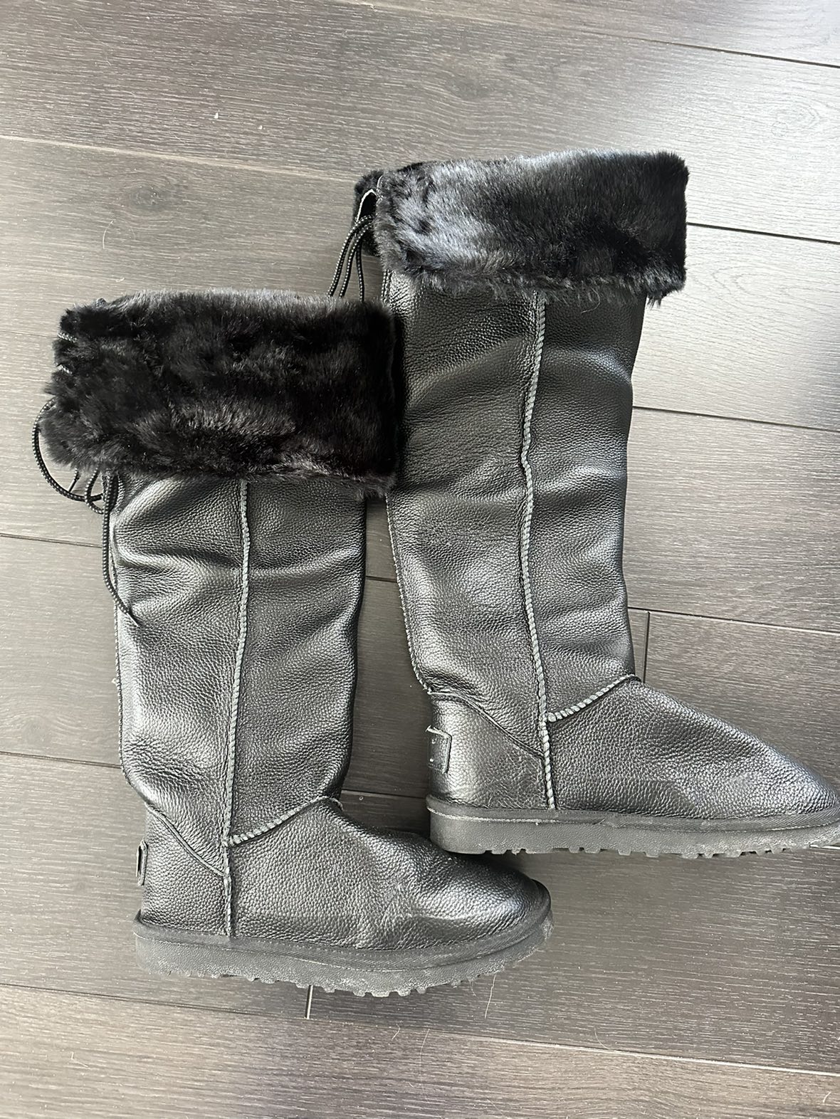 Extra warm, knee length Ugg type winter boots. Size 8 women’s.