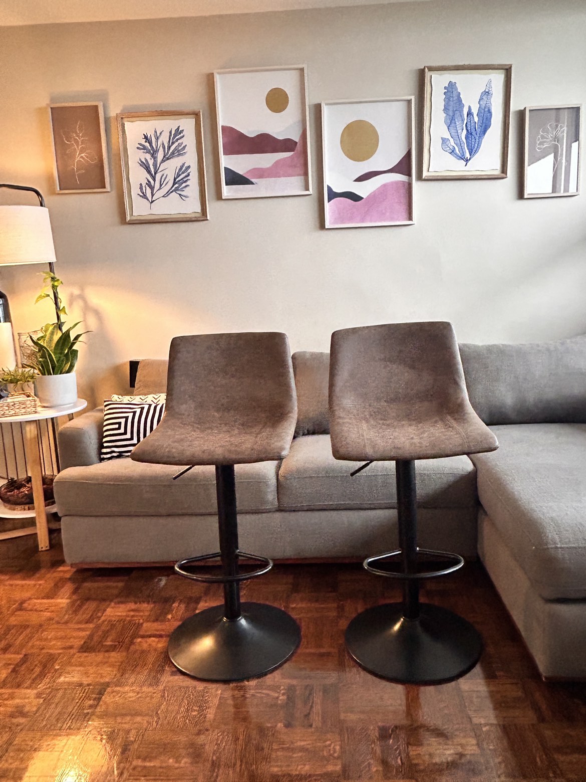 Adjustable Bar stools With matte Black metal legs.