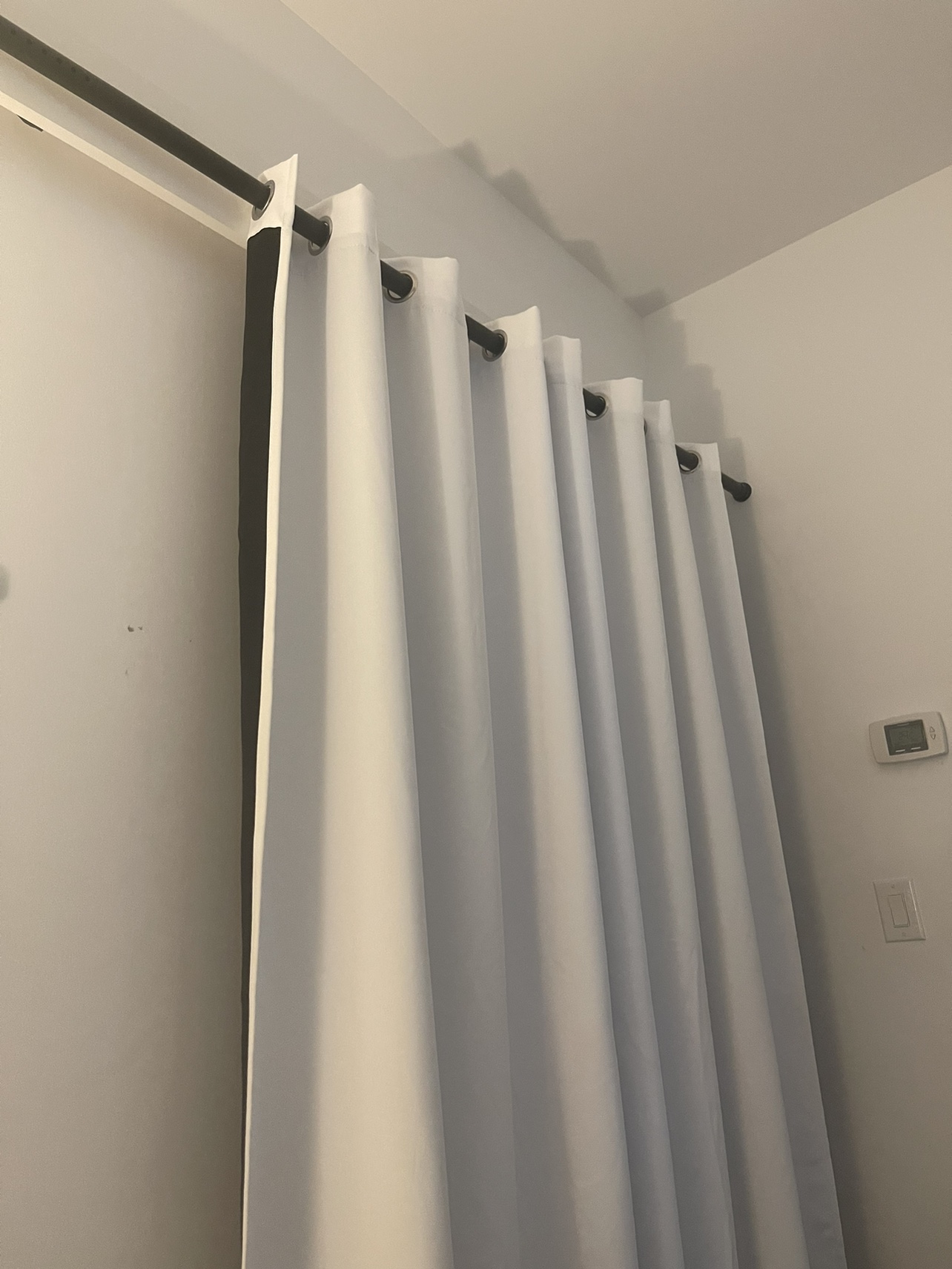 Blackout curtain with rod