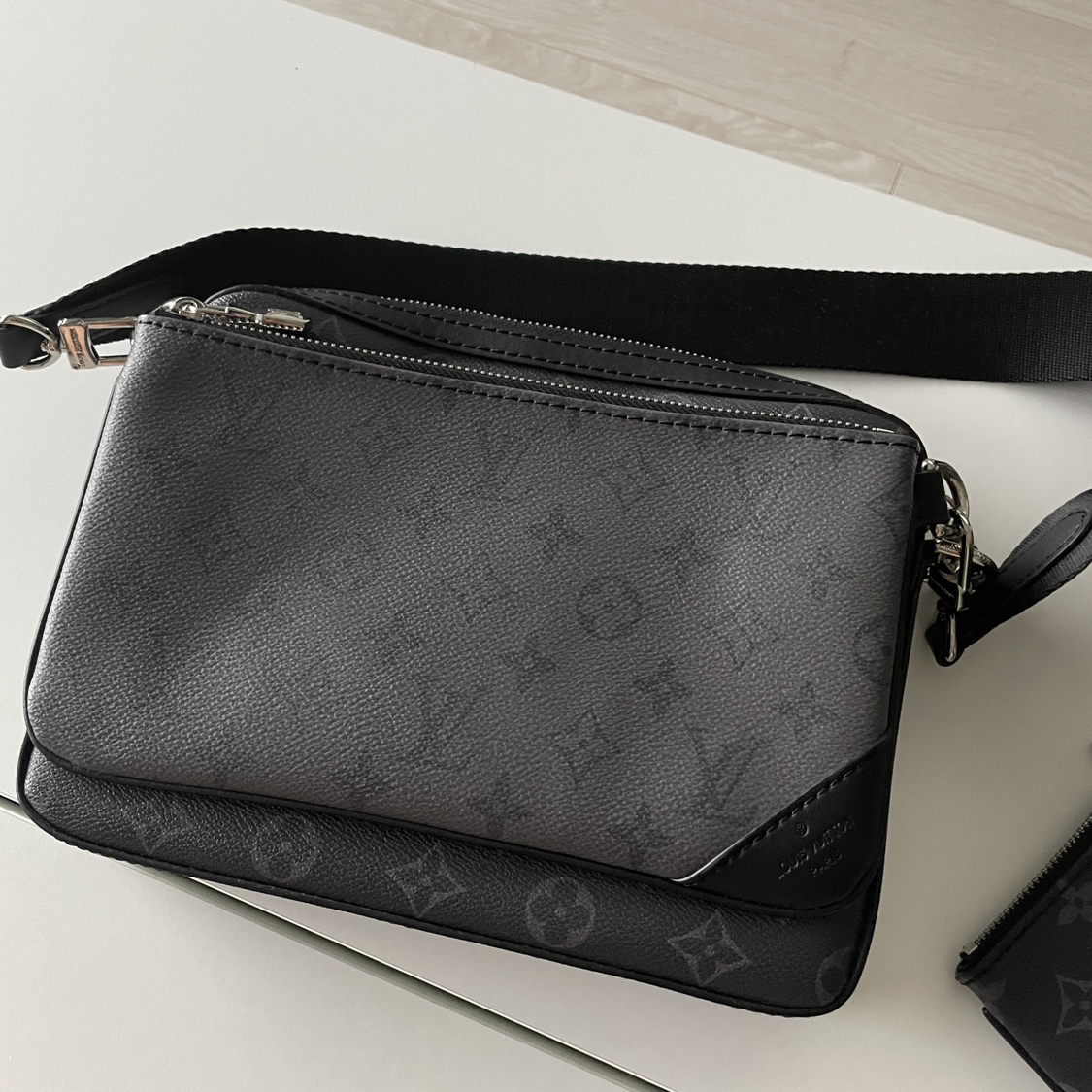 LV dual cross bag.