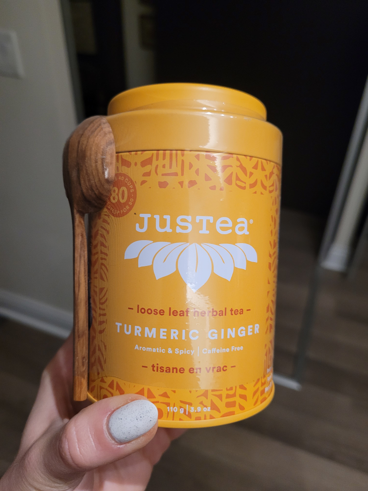 turmeric ginger loose leaf tea with wooden spoon thumbnail