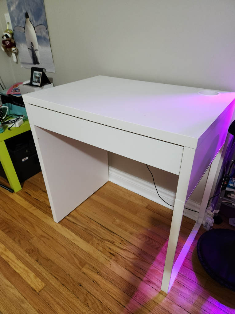 Small white IKEA MICKE desk