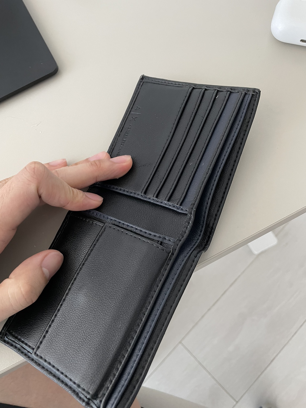 Armani exchange wallet image indicator(2)