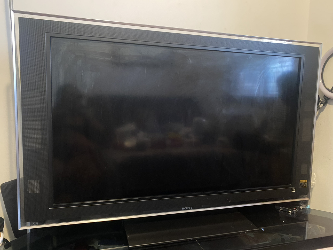 Sony Full HD 2080 TV and black temper glass TV stand image indicator(3)