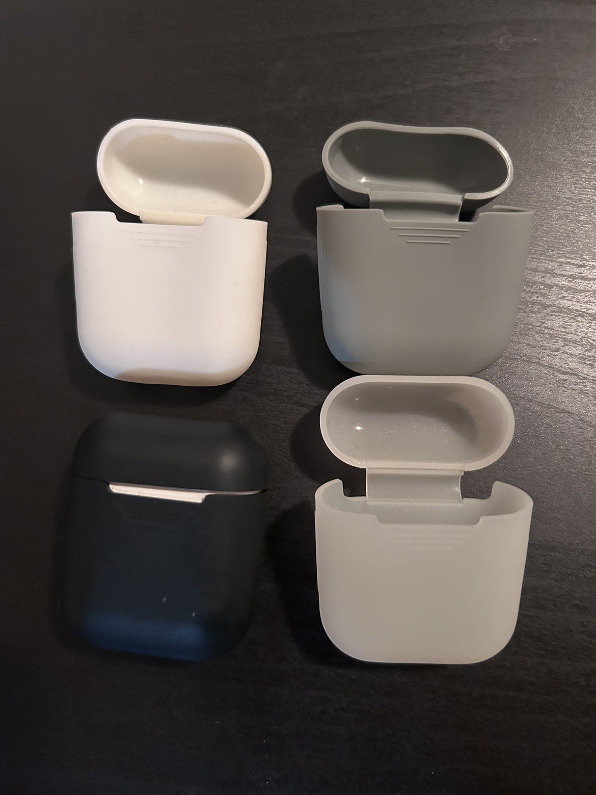 first generation genuine apple airpods (and 4 silicone cases) - photo 3