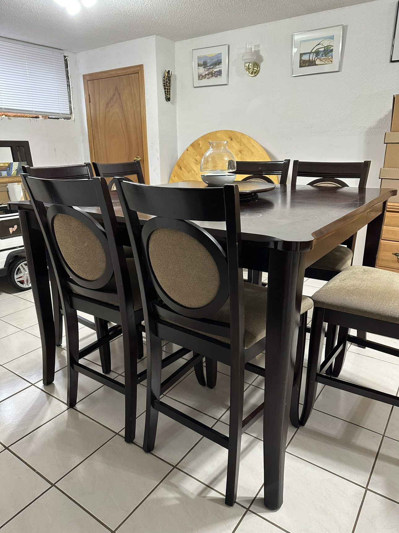 High top dining table with 6 chairs and a lazy Susan