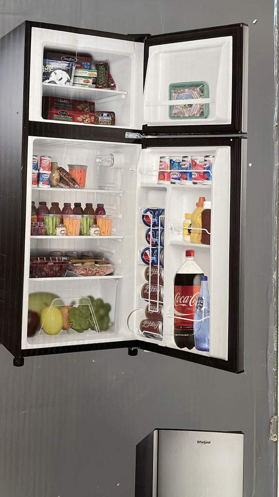 Almost brand new Whirlpool refrigerator 4.6 cu.ft double door - photo 4