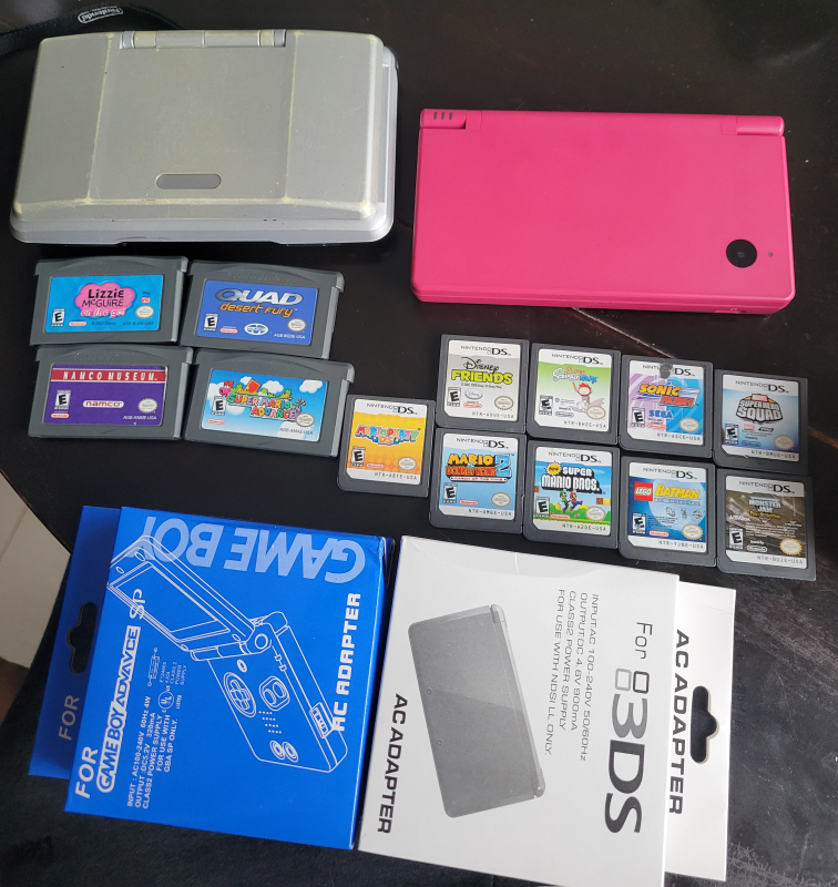 Nintendo ds and dsi with games and charger thumbnail