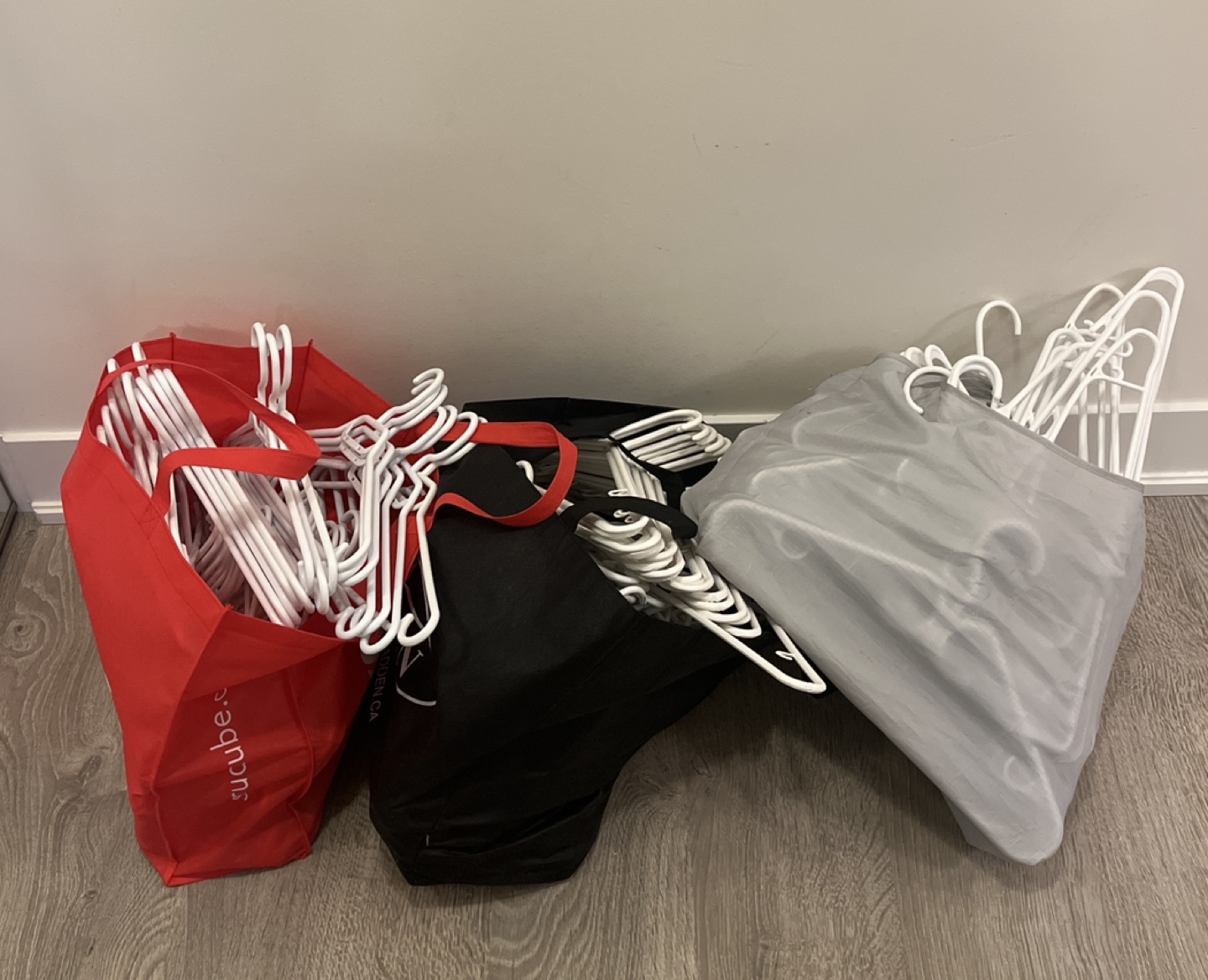FREE - white plastic hangers (~125) thumbnail