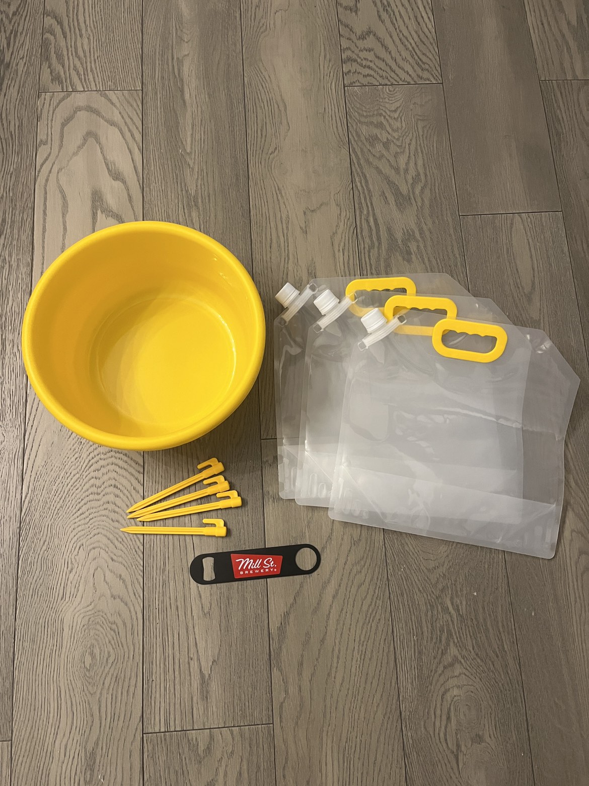 portable water carriers + wash basin + tent pegs + bottle opener thumbnail