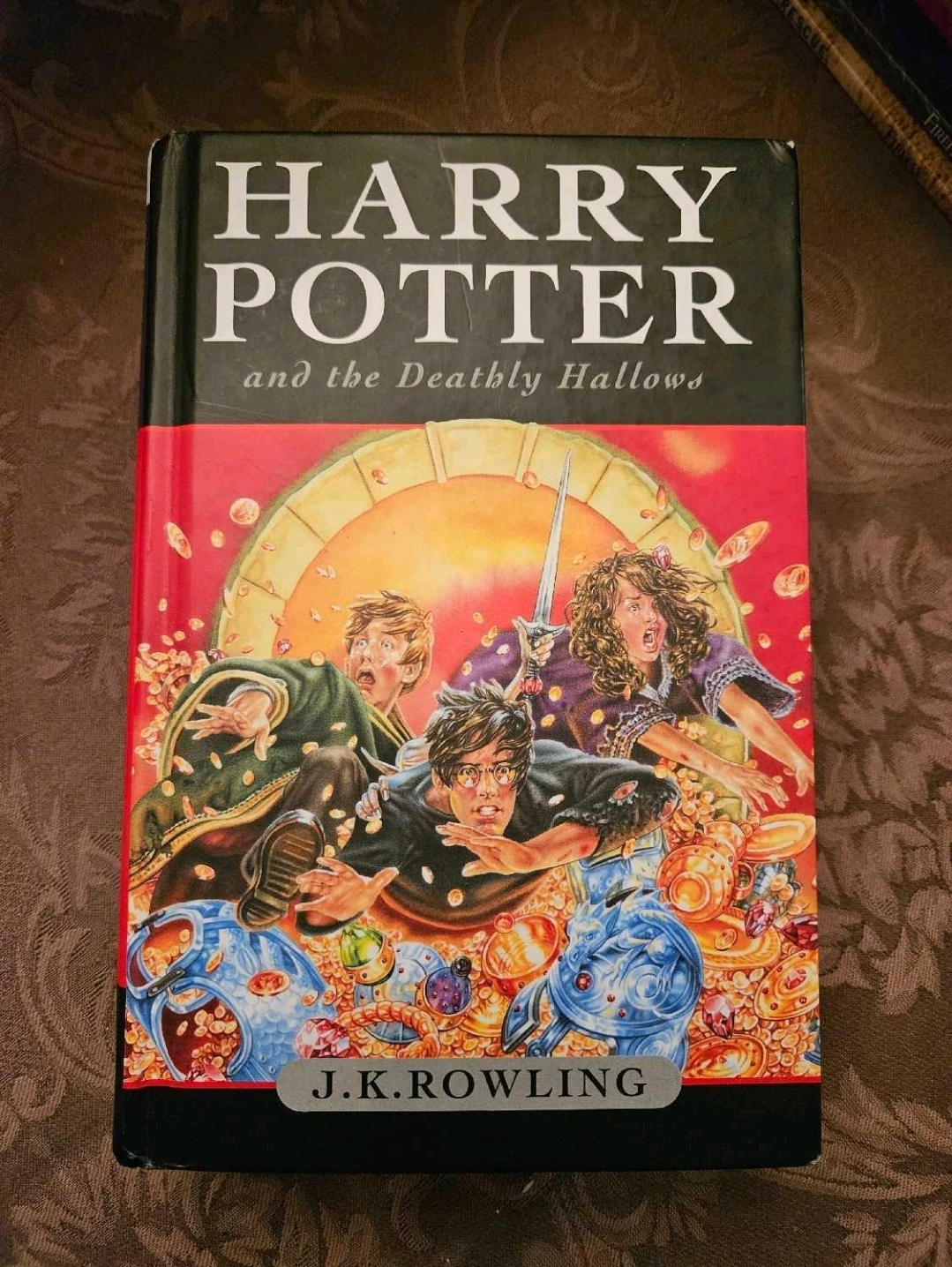 Harry Potter and the Deathly Hallows- hard cover book thumbnail