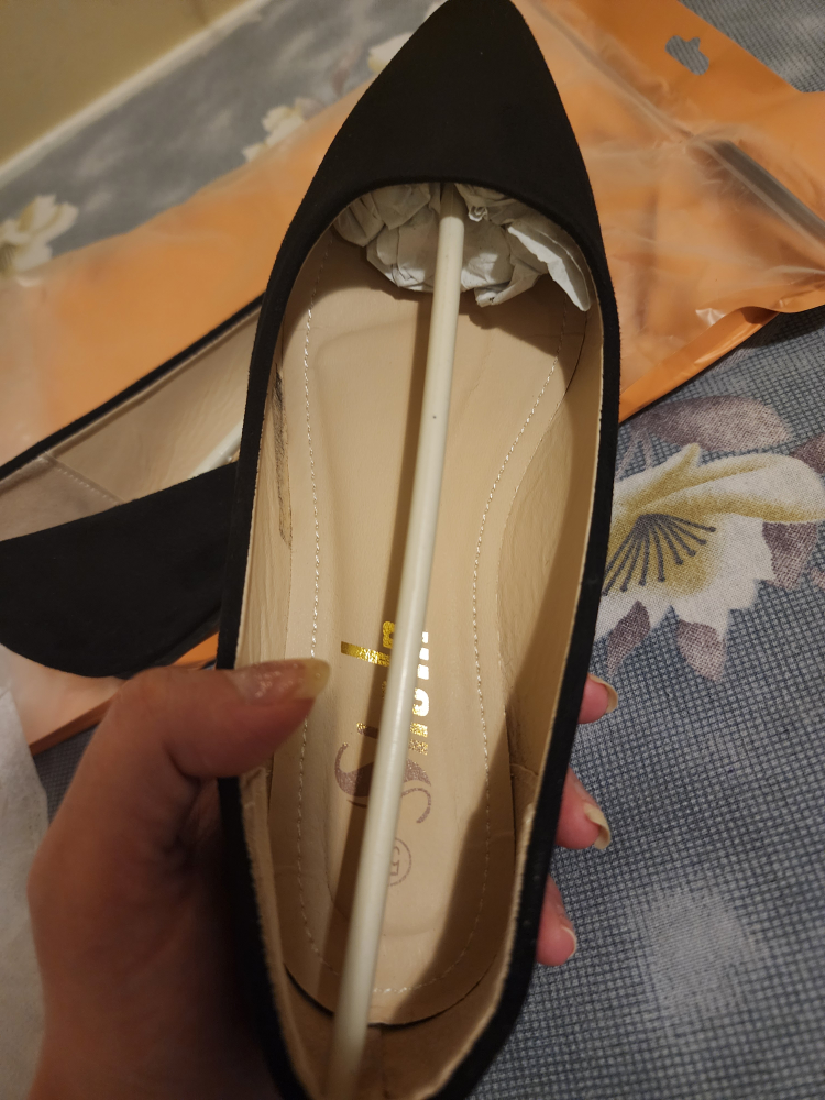 Black flat footwear