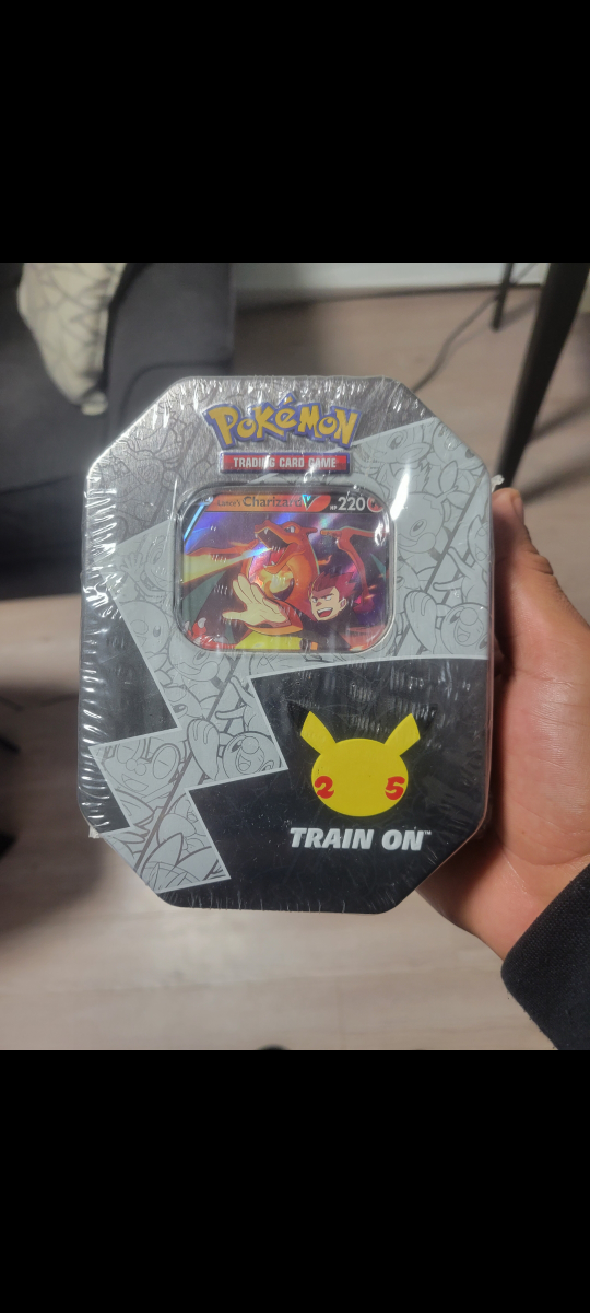 lances charizard tin thumbnail