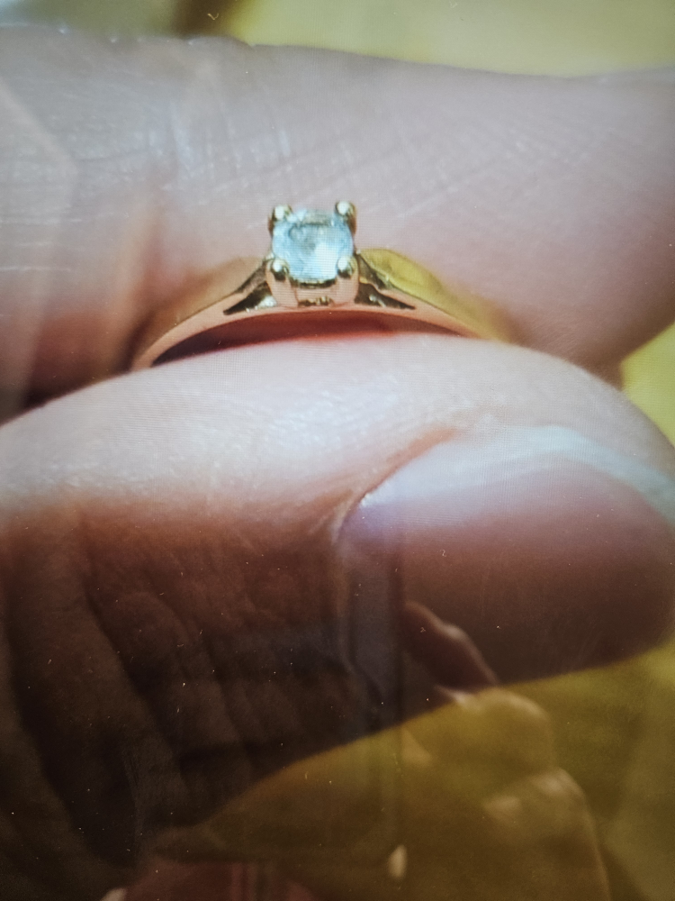10k solid goold ring with light blue-green stone