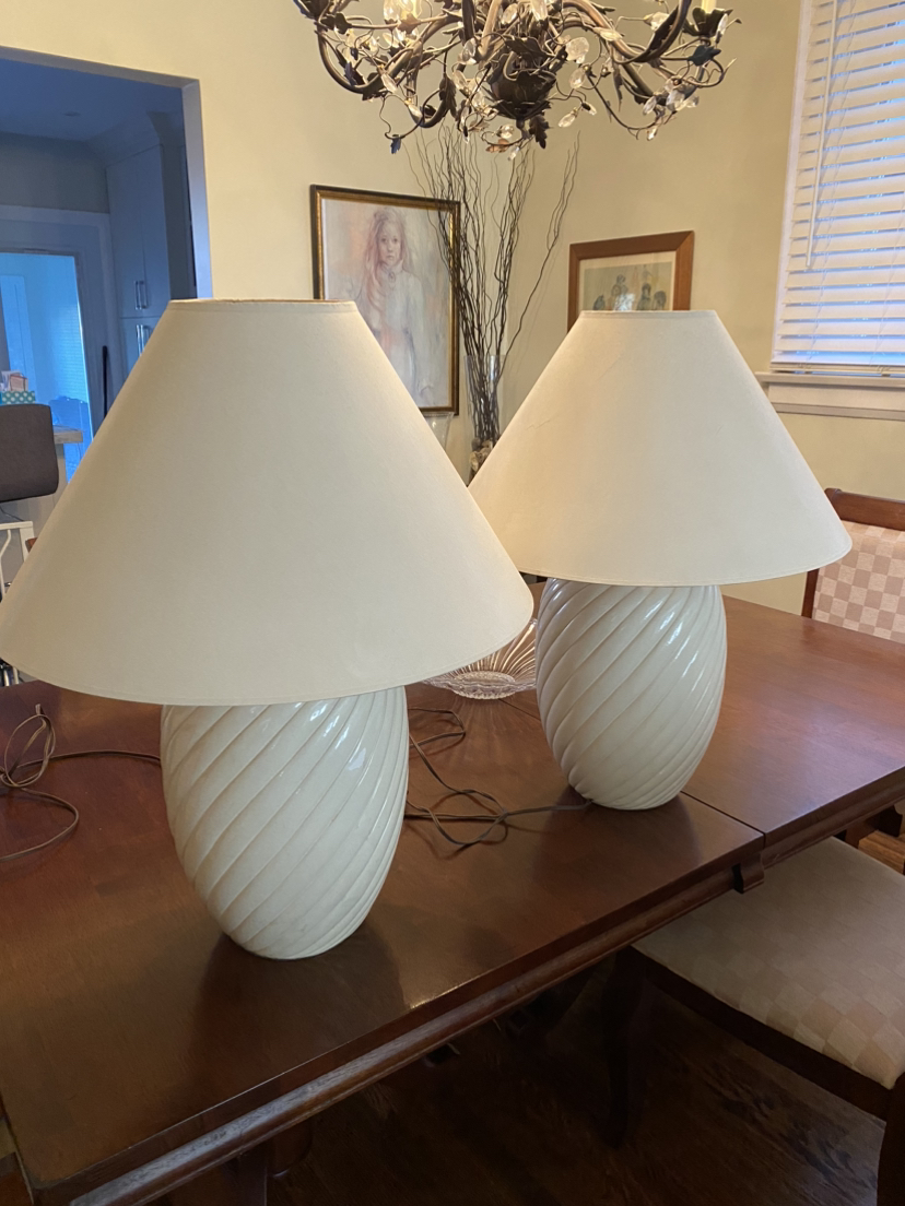 Two white ceramic table lamps
