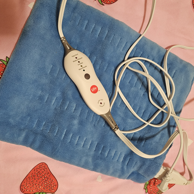 Electric heating pad for back, period cramps... thumbnail