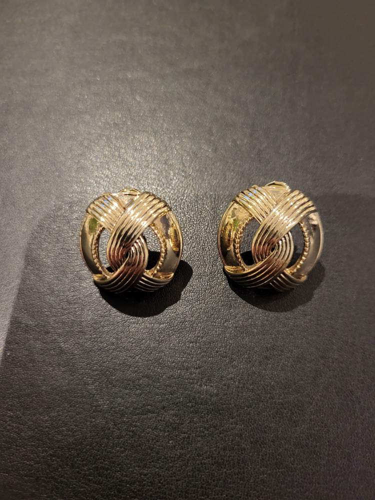 Napier gold tone twisted knot clip on earrings image indicator(2)