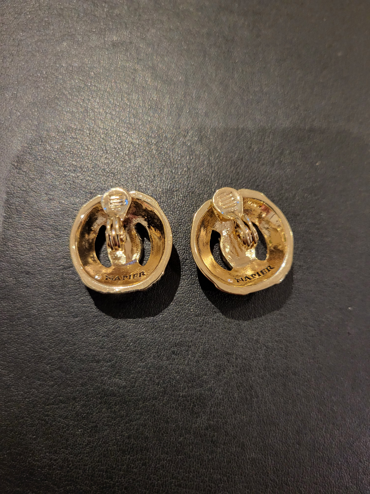 Napier gold tone twisted knot clip on earrings image indicator(4)