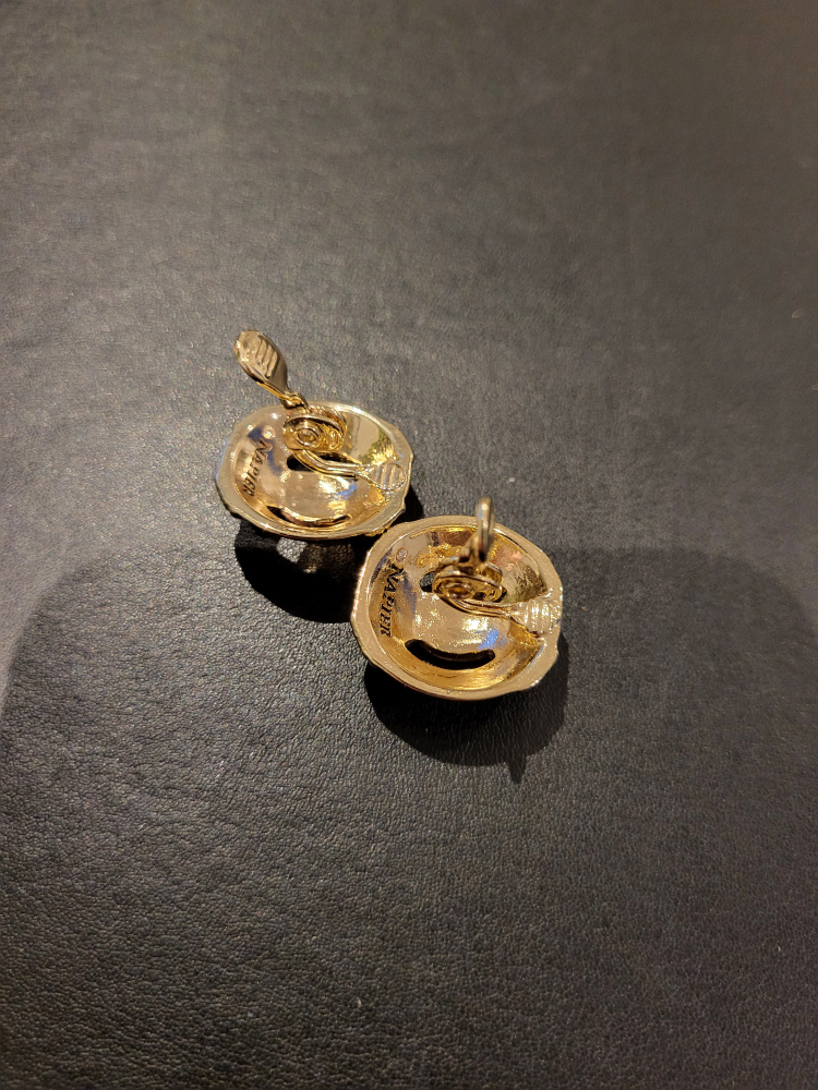 Napier gold tone twisted knot clip on earrings image indicator(5)