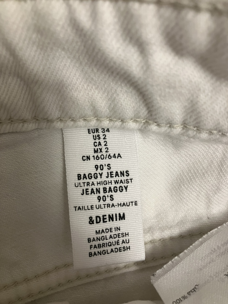 High-waisted wide-legged white H&M jeans - photo 3