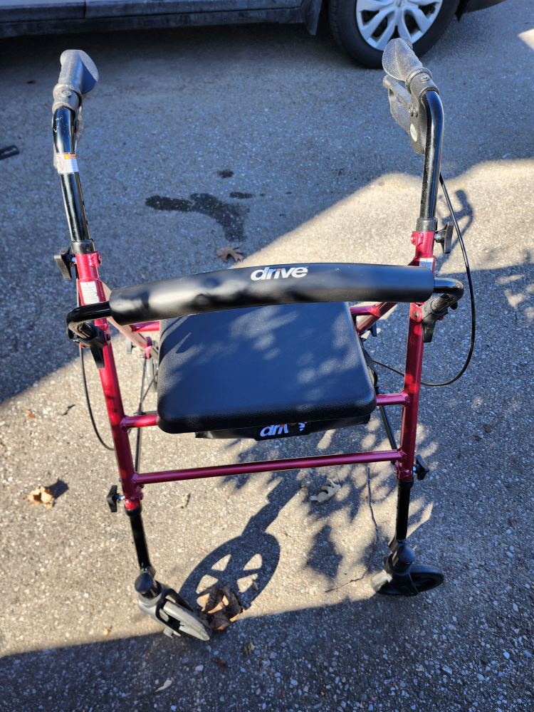Walker with 4 wheels. Good condition