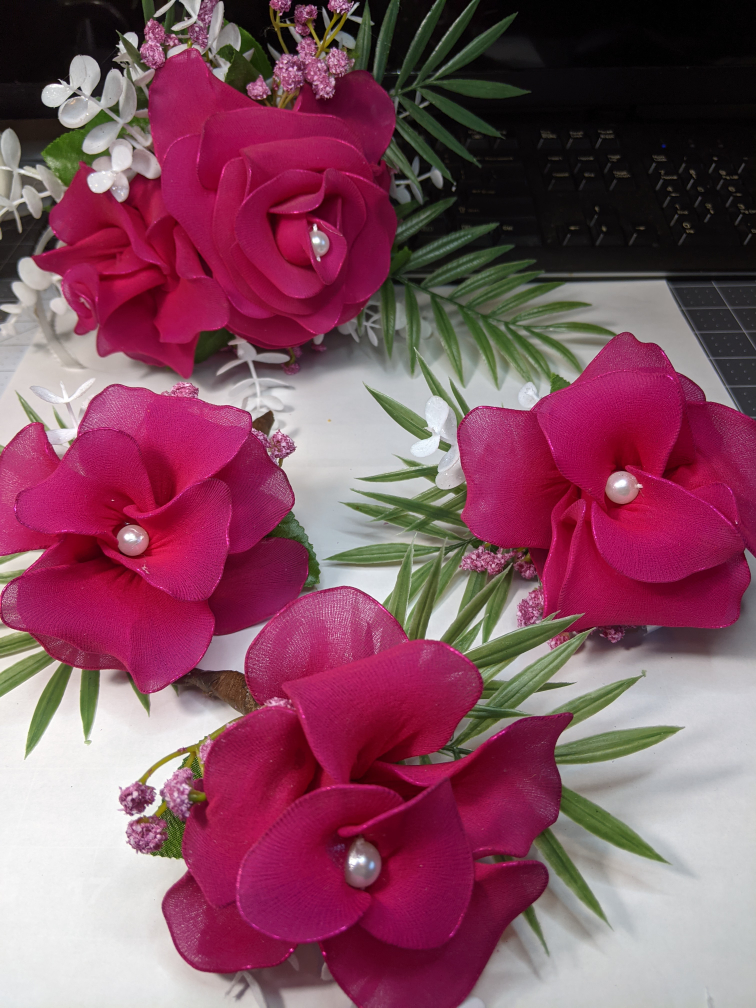 Gorgeous deep magenta bridal bouquet/corsages