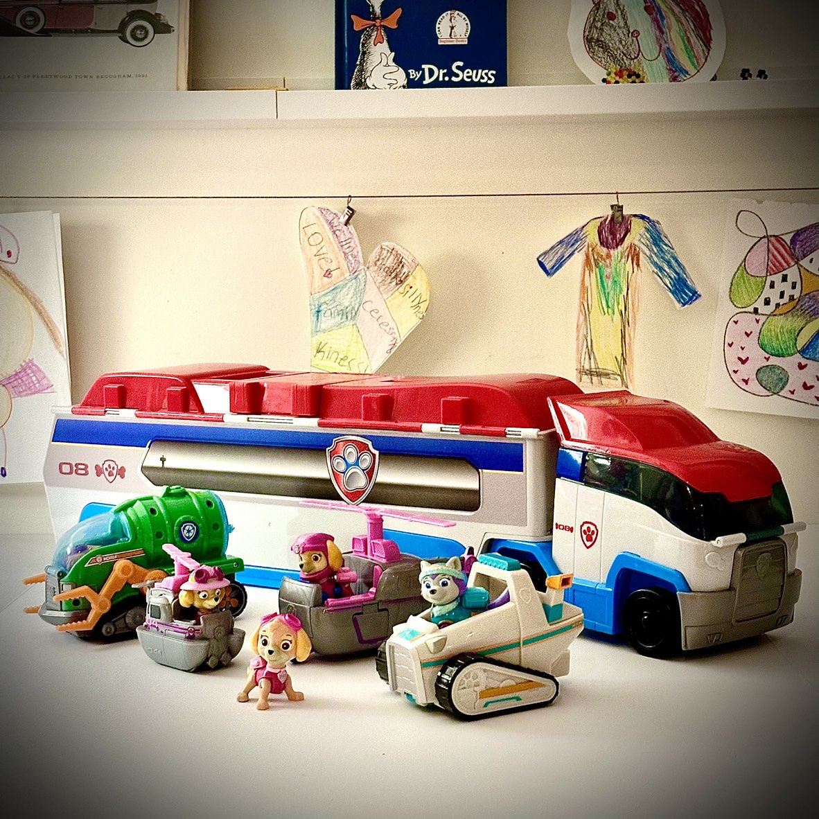 Paw Patrol Transport Truck and multiple figurines and vehicles