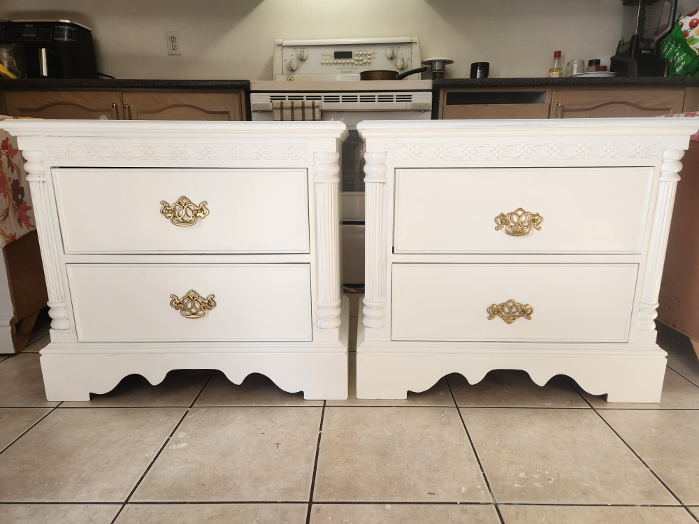 2 large refinished white nightstands. message fir price.