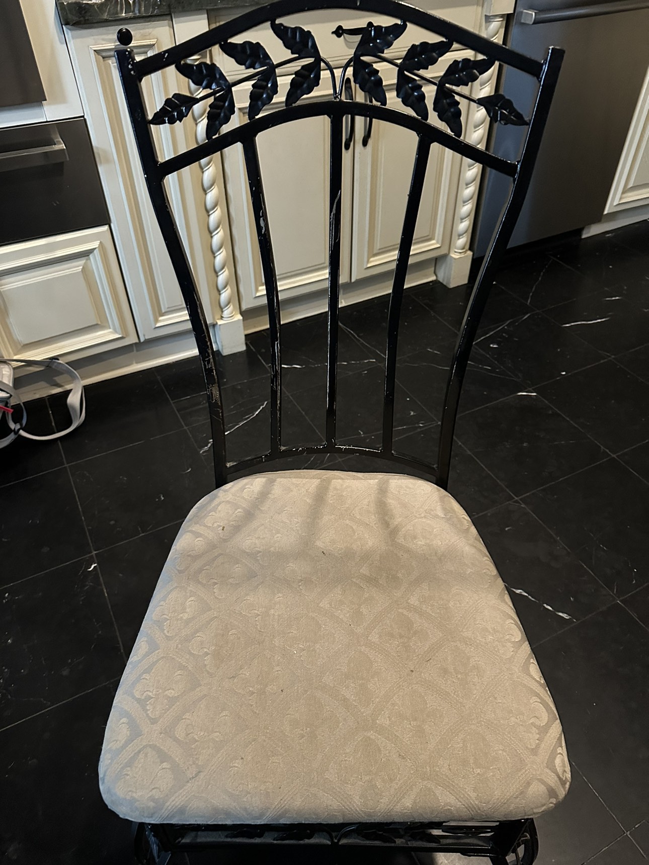 Dining table and 4 chairs . Marble and wrought iron image indicator(2)