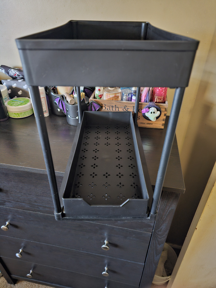 Under the sink storage. bottom shelf slides out for easy access. thumbnail