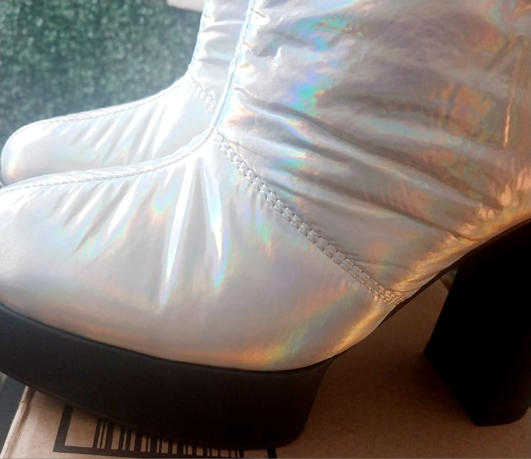 Ladies' florescent silver colored puff boots image indicator(3)