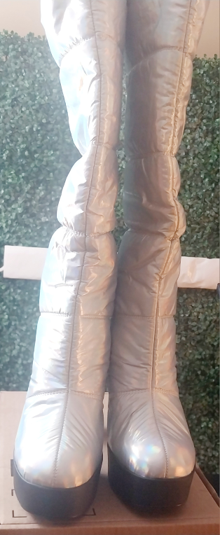 Ladies' florescent silver colored puff boots image indicator(4)