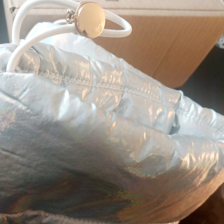 Ladies' florescent silver colored puff boots image indicator(5)