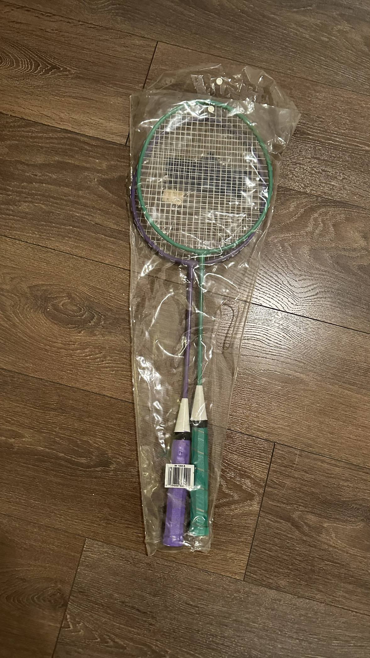 Two badminton rackets