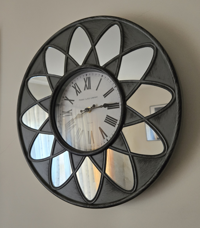 wall clock with mirror detail