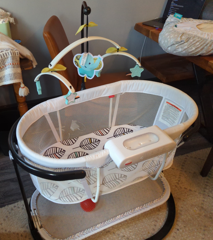 Bassinet with vibration, music, white noise