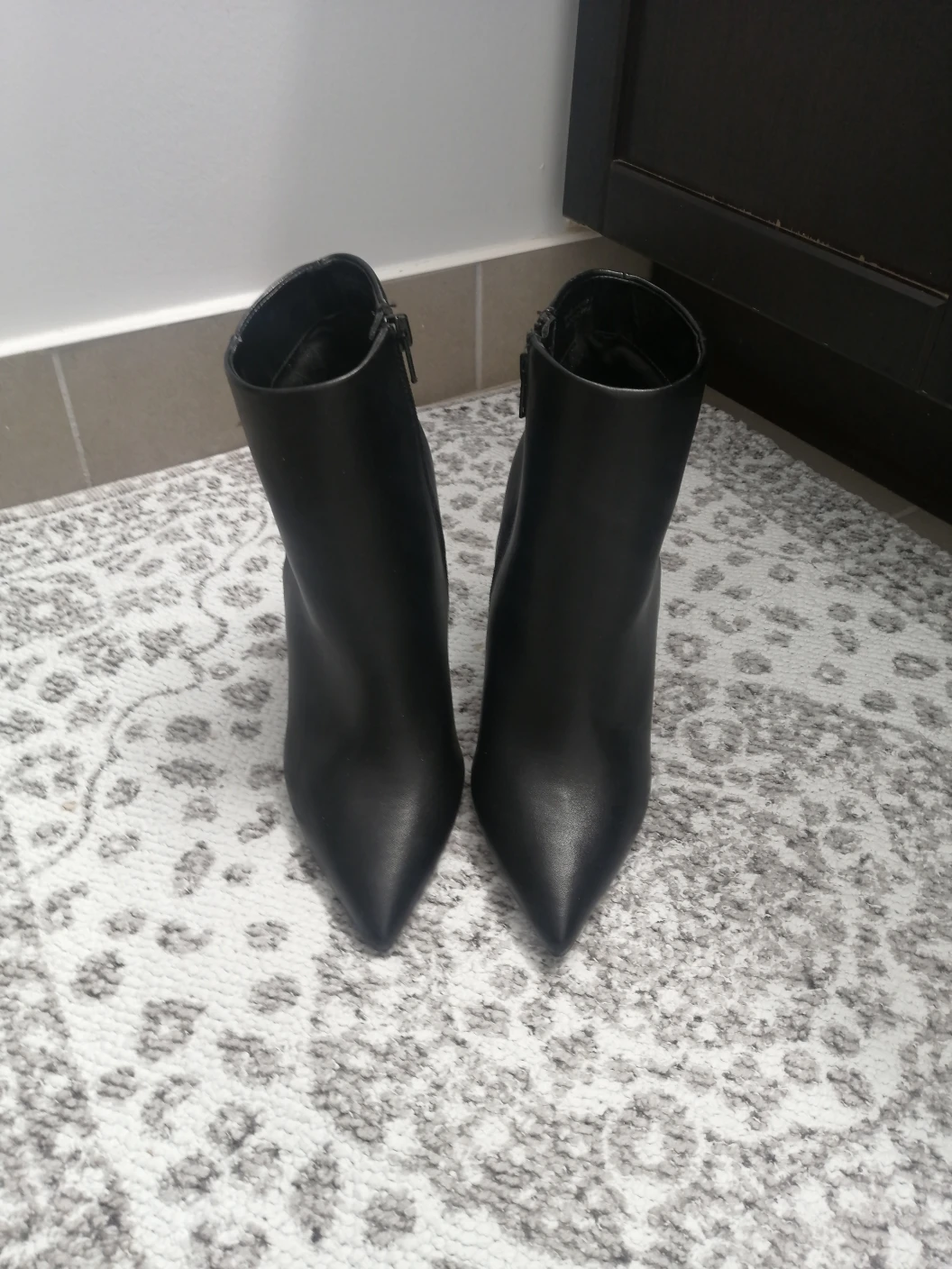 Black high heeled ankle boots