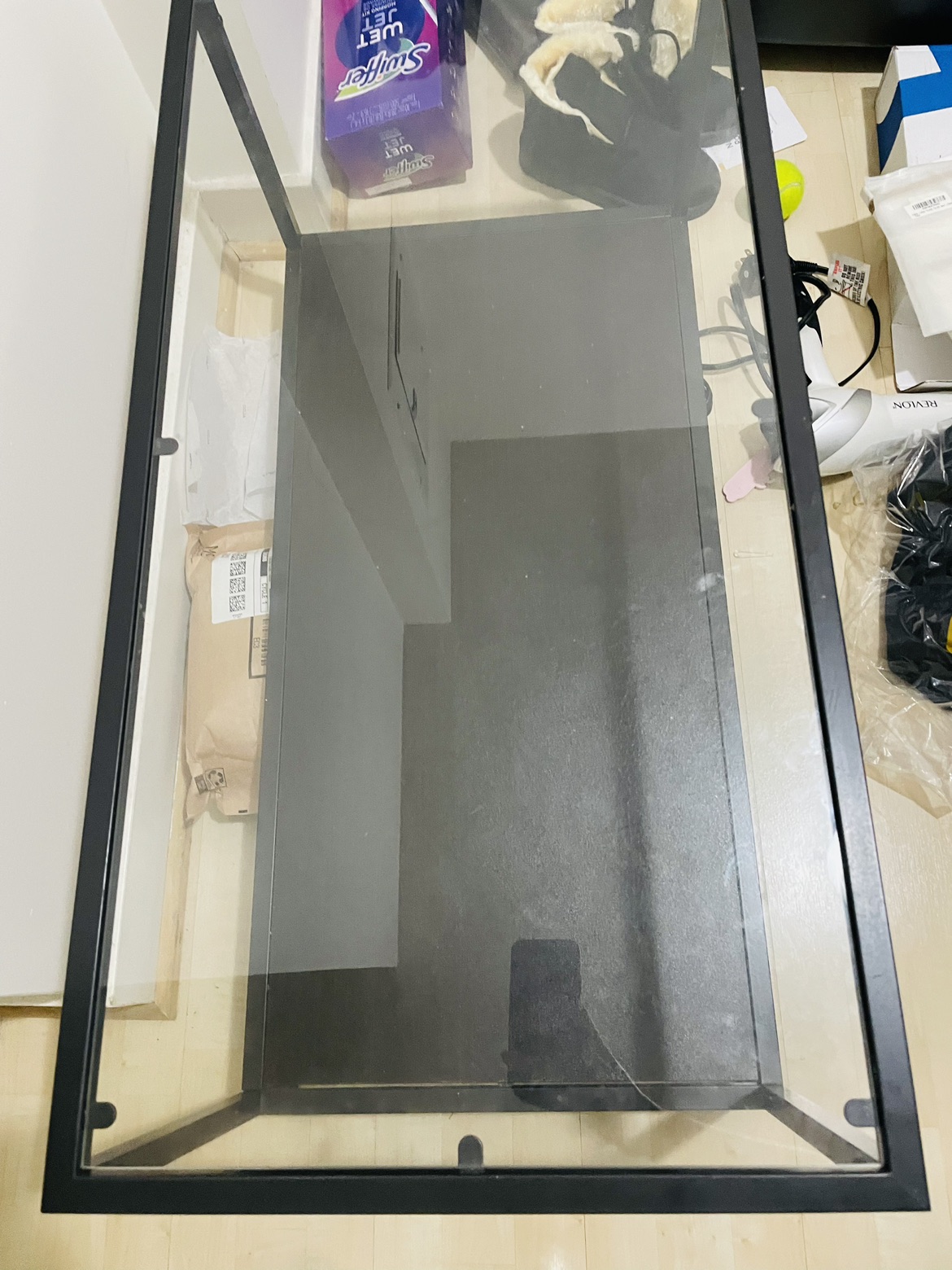 Study glass top center table with an attachment