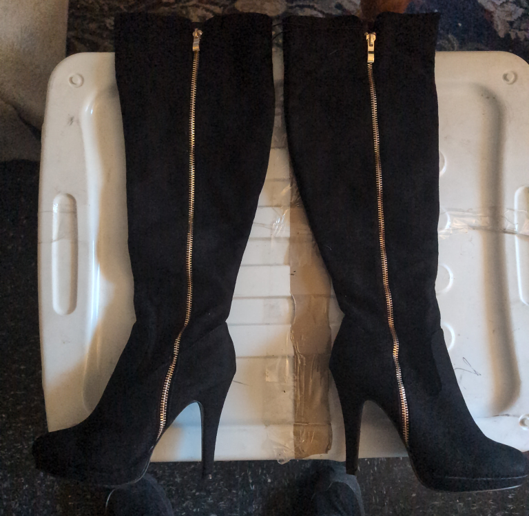 Revamped knee high stiletto heel boots, size 6