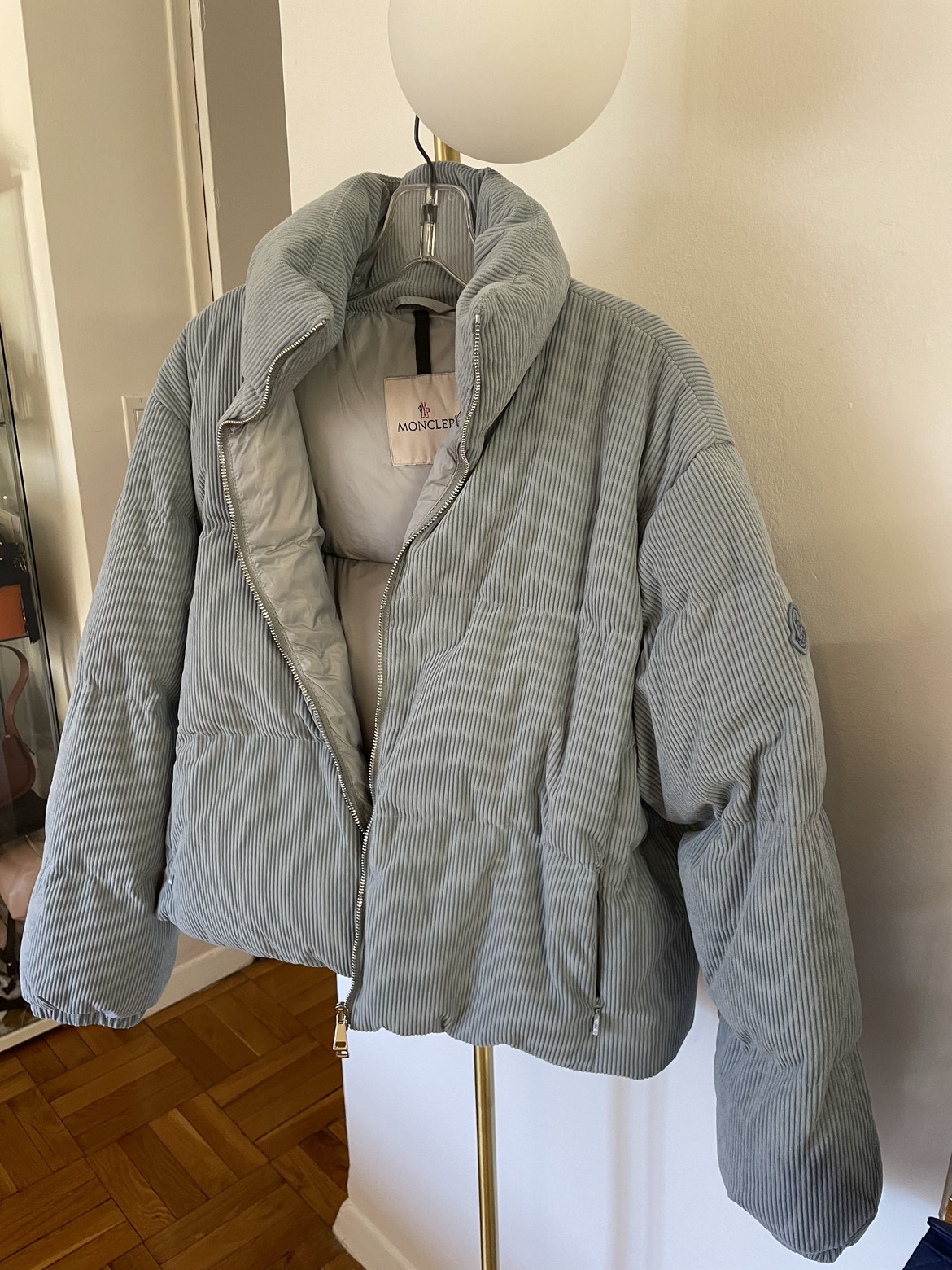 Moncler light blue puffer jacket