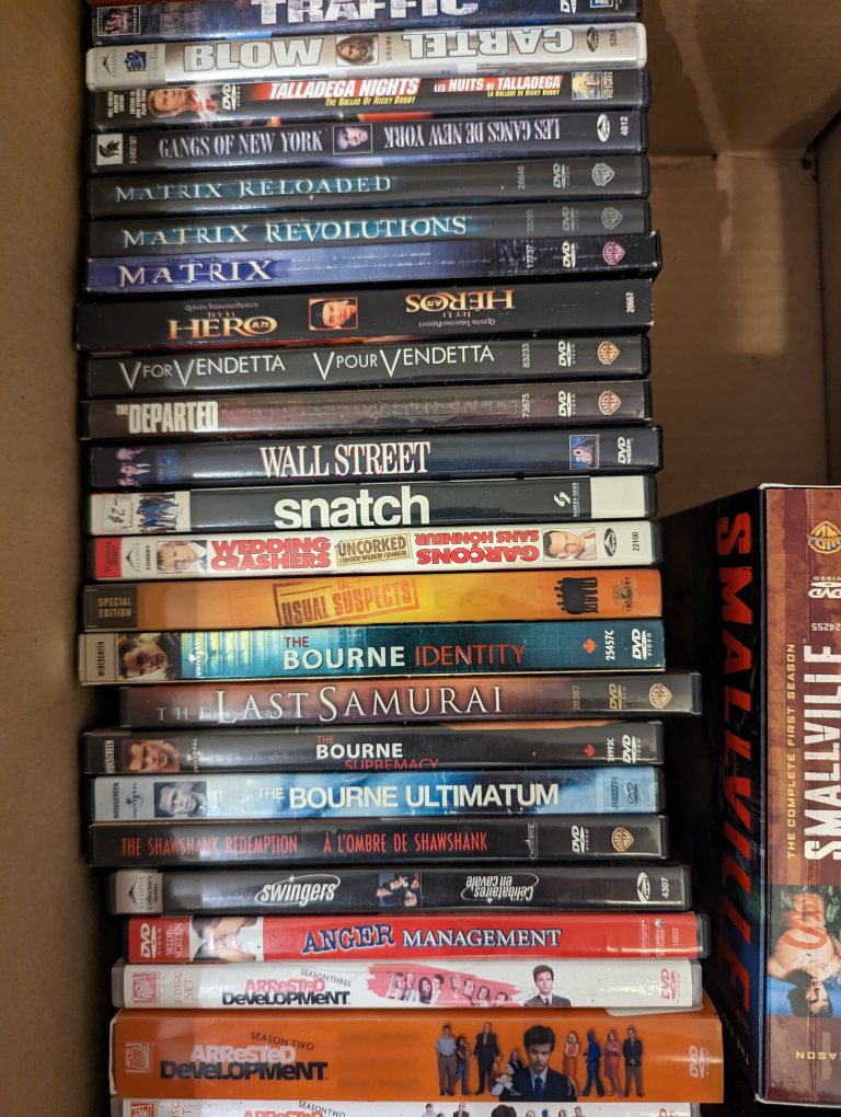 Box of Assorted DVDs - photo 2