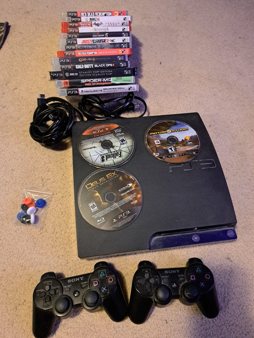 PS3 + 2 controllers + games + replacement thumbpads