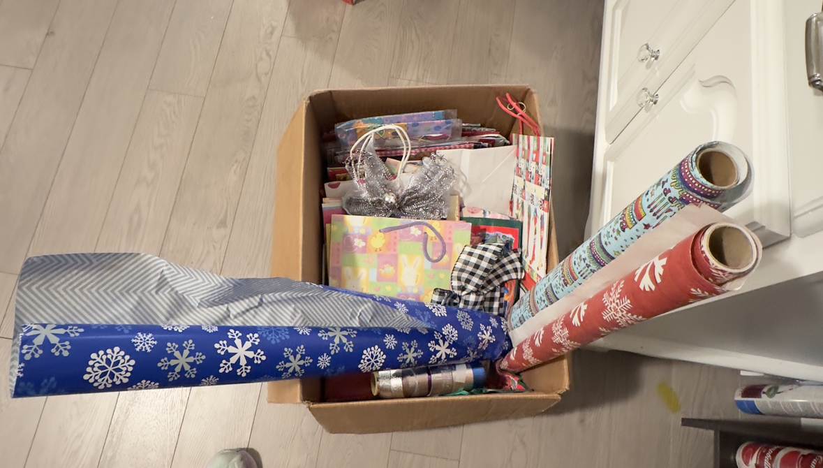 Gift bags, wrapping paper, stickers, rolls of ribbon.